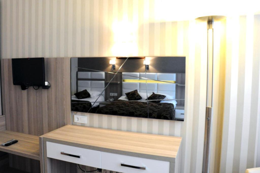 Nil Hotel Istambul Quarto foto